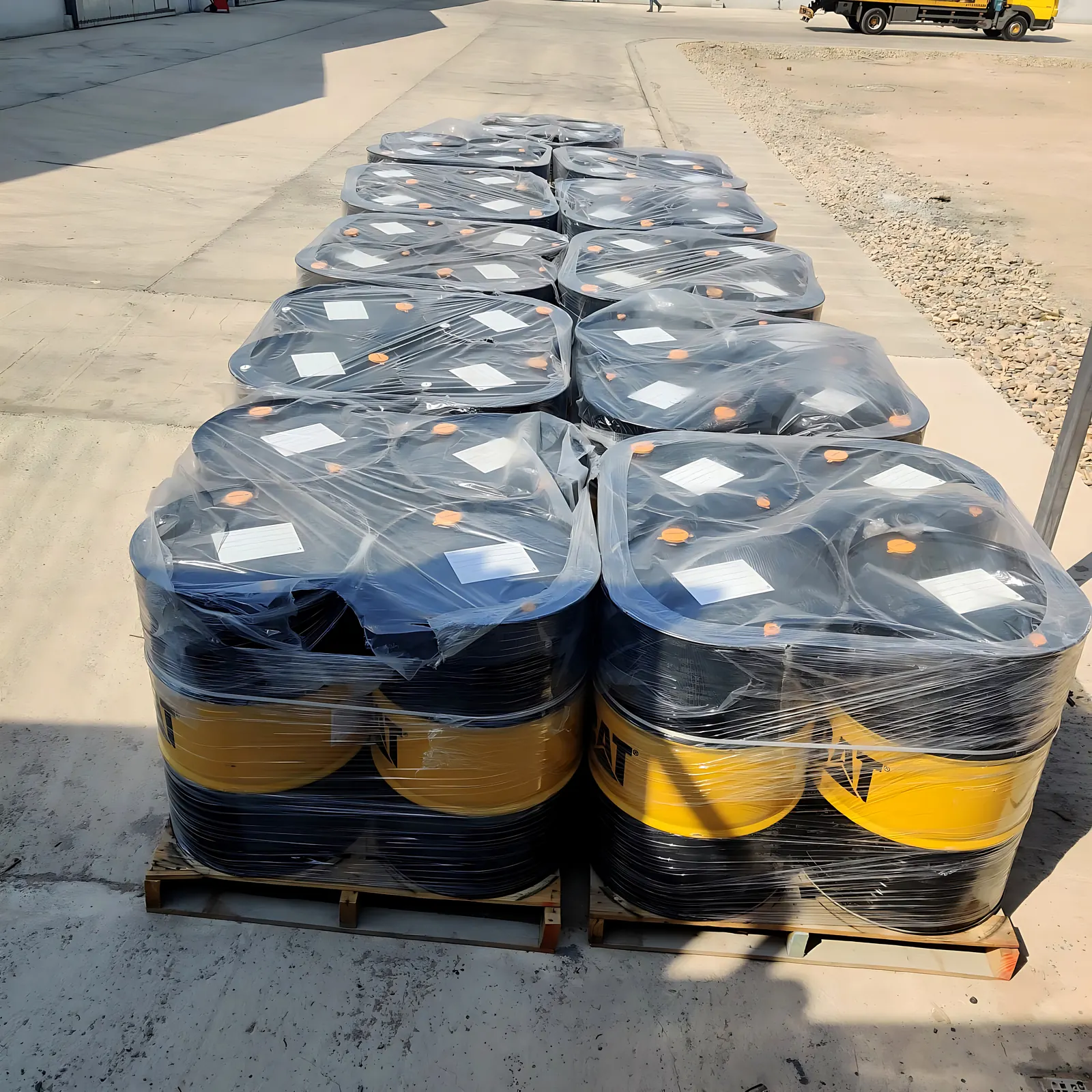 Genuine Caterpillar lubricants, palletised and shrink-wrapped at our Basra warehouse